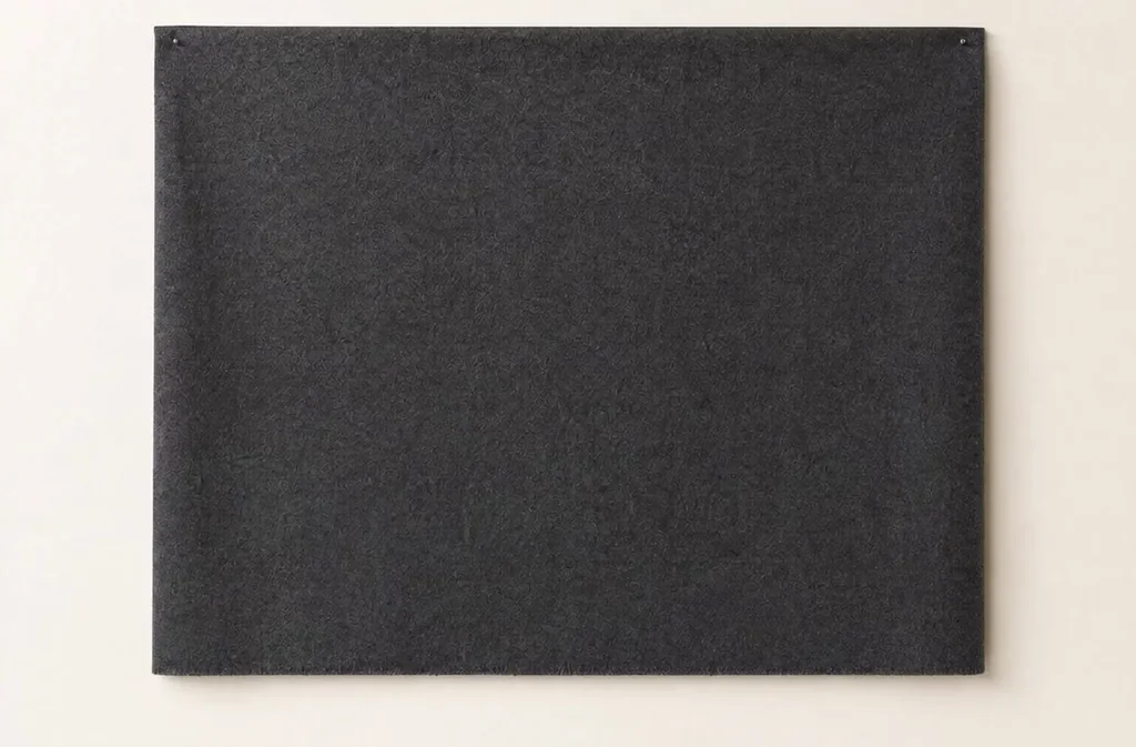 Wool melton, pinned flat against a plain backdrop.